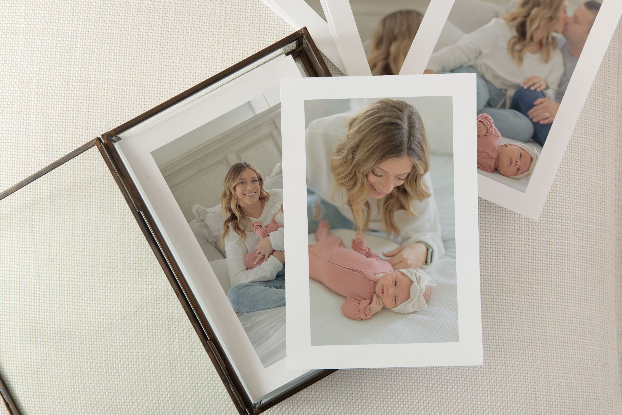 framed newborn photography prints displayed together - St Louis newborn photographer